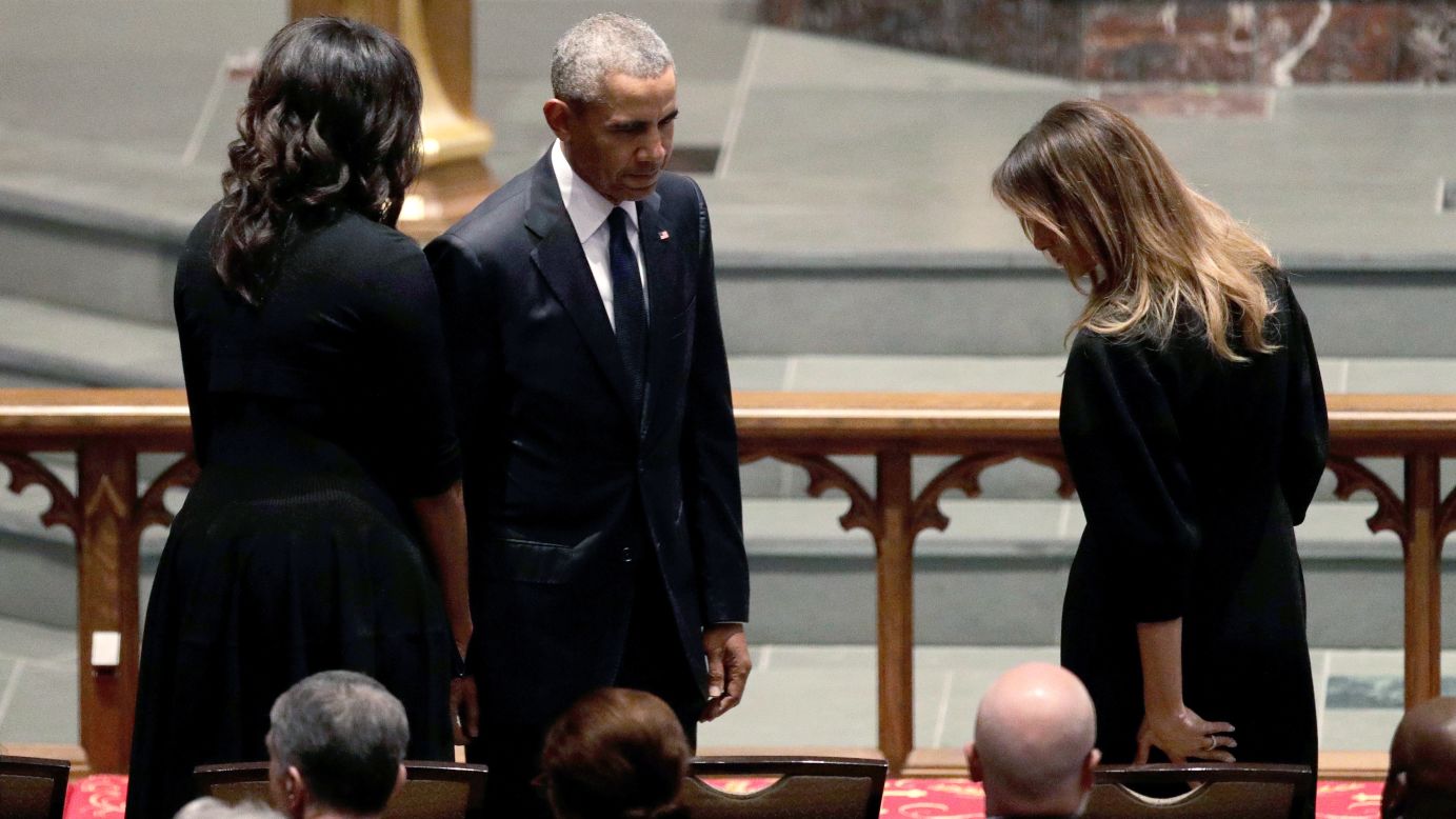 Former President Barack Obama and former first lady Michelle Obama greet first lady Melania Trump at St. Martin's Episcopal Church. 
