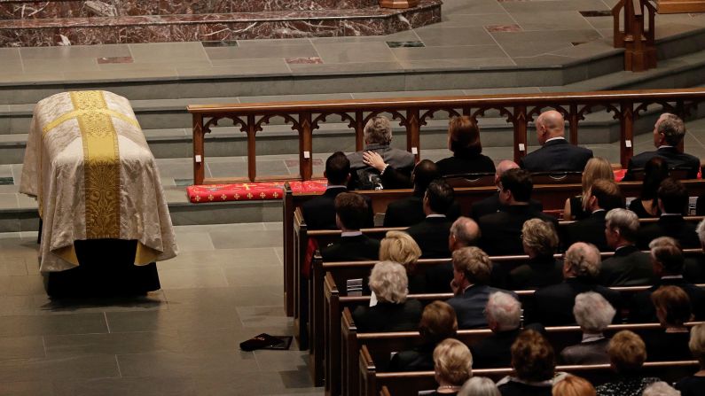 Former President George H. W. Bush is comforted by his daughter Dorothy "Doro" Bush Koch. 