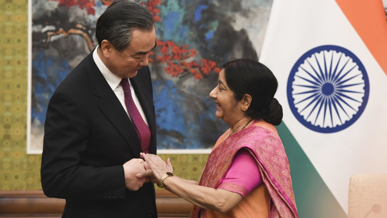 Indian Foreign Minister Sushma Swaraj shakes hands with Chinese Foreign Minister Wang Yi  April 22, 2018.