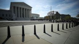 People wait in line to enter the U.S. Supreme Court, on April 23, 2018 in Washington, DC.