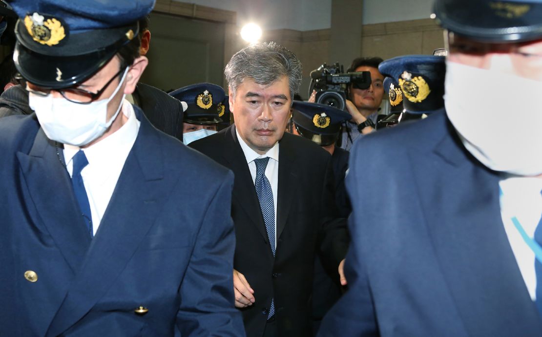 Japan's Administrative Vice Finance Minister Junichi Fukuda leaves the finance ministry in Tokyo amid allegations of sexual harassment.