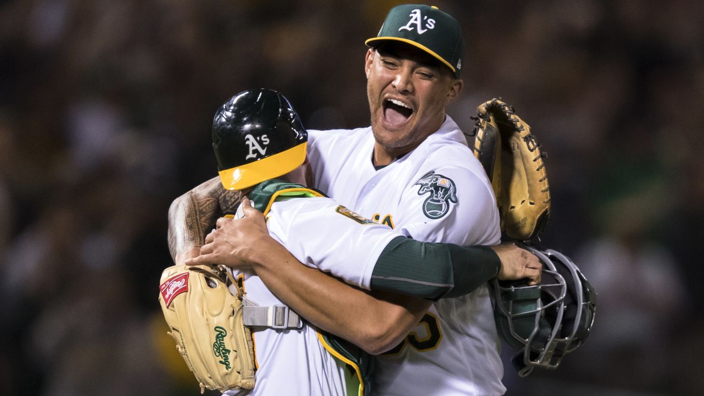 Oakland pitcher Sean Manaea, right, celebrates with catcher Jonathan Lucroy after <a href="https://bleacherreport.com/articles/2771847-sean-manaea-strikes-out-10-en-route-to-no-hitter-vs-scorching-hot-red-sox" target="_blank" target="_blank">throwing a no-hitter against Boston</a> on Saturday, April 21. It was the first no-hitter of the season.