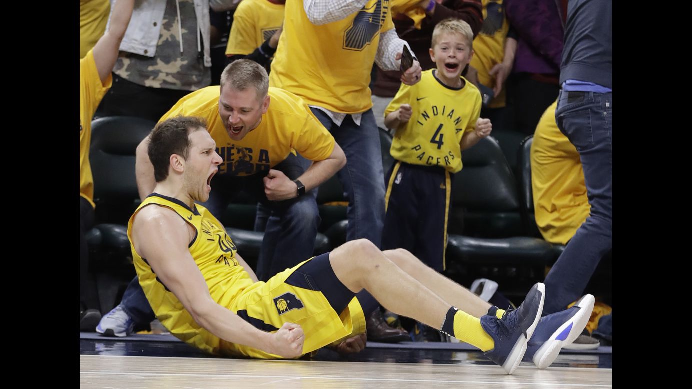 Fans celebrate with Indiana's Bojan Bogdanovic after he made a 3-pointer against Cleveland in Game 3 of their first-round playoff series on Friday, April 20. Bogdanovic was also fouled on the play. <a href="http://bleacherreport.com/articles/2771668-pacers-take-2-1-lead-over-lebron-james-cavs-as-bojan-bogdanovic-drops-30" target="_blank" target="_blank">He had a season-high 30 points</a> in the Indiana victory.