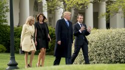From left, Brigitte Macron, first lady Melania Trump, President Donald Trump and French President Emmanuel Macron, right, walk to a tree planting ceremony on the South Lawn of the White House in Washington, Monday, April 23, 2018. 