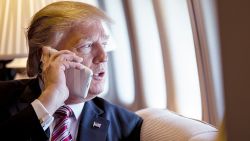 President Donald Trump talks on the phone aboard Air Force One during a flight to Philadelphia, Pennsylvania, to address a joint gathering of House and Senate Republicans, Thursday, January 26, 2017. This was the Presidentâs first Trip aboard Air Force One. (Official White House Photo by Shealah Craighead) 