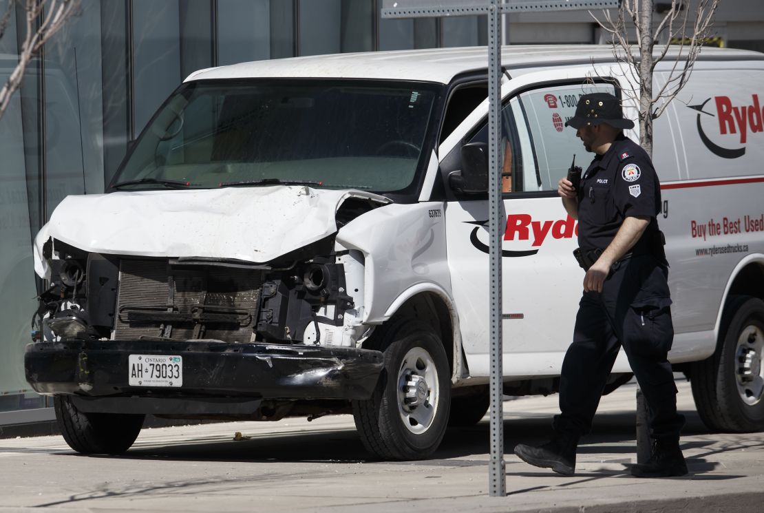 Police inspect a van suspected of being involved in a collision injuring at least eight people at Yonge St. and Finch Ave. on April 23, 2018 in Toronto, Canada. 