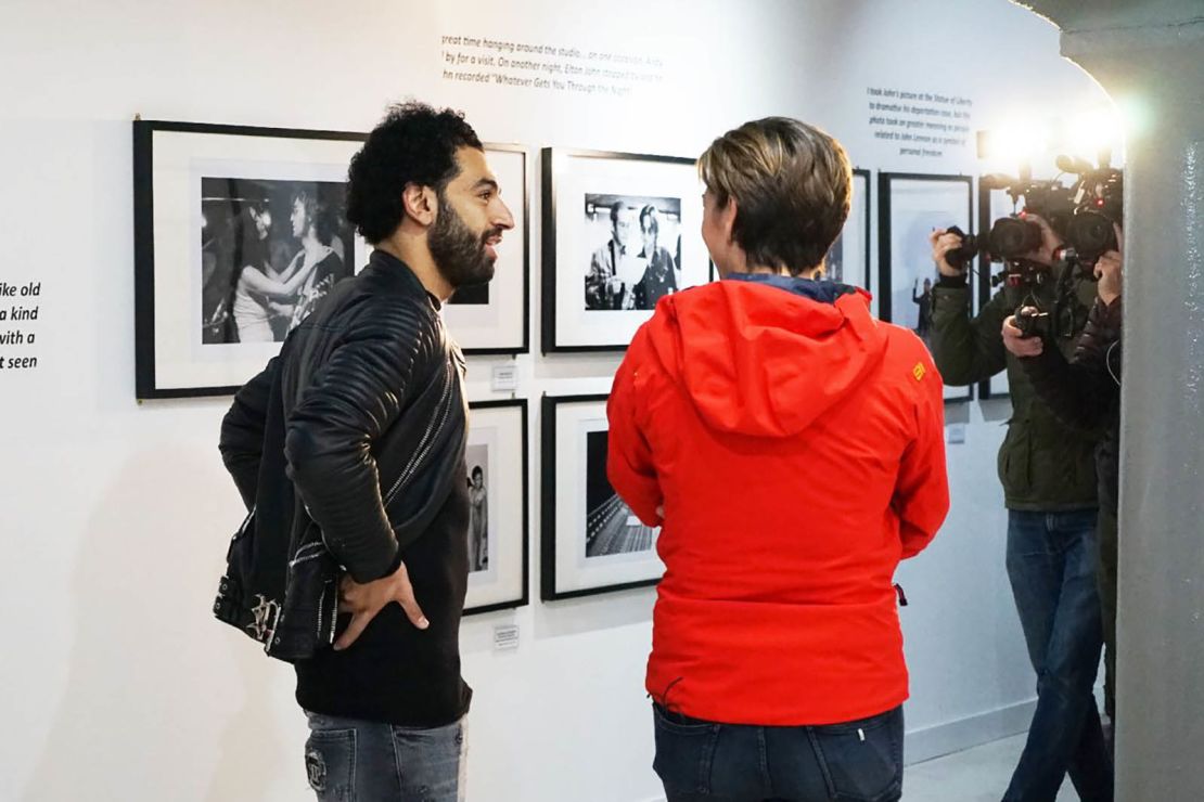 Salah takes a look around the exhibits at the Beatles Museum. 