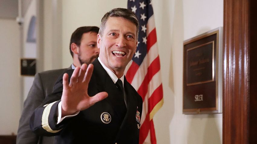 Ronny Jackson waves to journalists as he heads into a meeting on Capitol Hill on April 16, 2018.