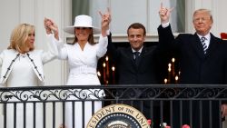 President Donald Trump, French President Emmanuel Macron, first lady Melania Trump and Brigitte Macron hold hands on the White House balcony during a State Arrival Ceremony at the White House in Washington, Tuesday, April 24, 2018. (AP Photo/Pablo Martinez Monsivais)