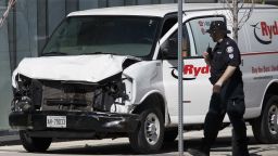 TORONTO, ON - APRIL 23:  Police inspect a van suspected of being involved in a collision injuring at least eight people at Yonge St. and Finch Ave. on April 23, 2018 in Toronto, Canada. A suspect is in custody after a white van collided with multiple pedestrians. (Photo by Cole Burston/Getty Images)
