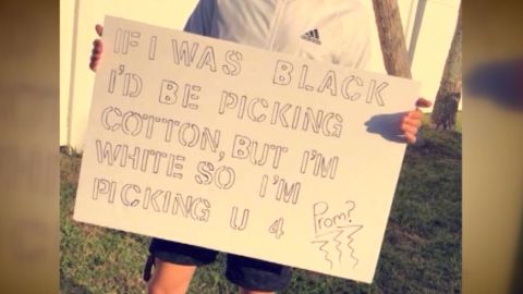 An unidentified Riverview High School student with his promposal sign.