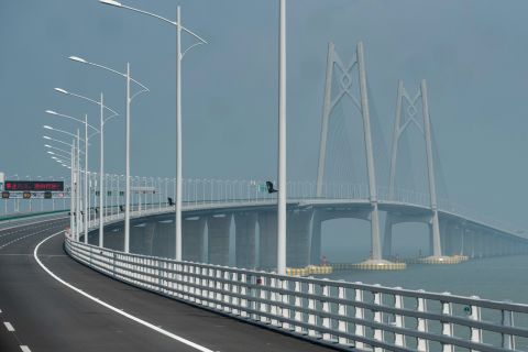 The speed limit on the bridge has been set at 62 miles (100 kilometers) an hour. Cars will drive on the right along the Chinese sections of the bridge, and switch to the left in Hong Kong and Macau, to match the driving styles in each city.