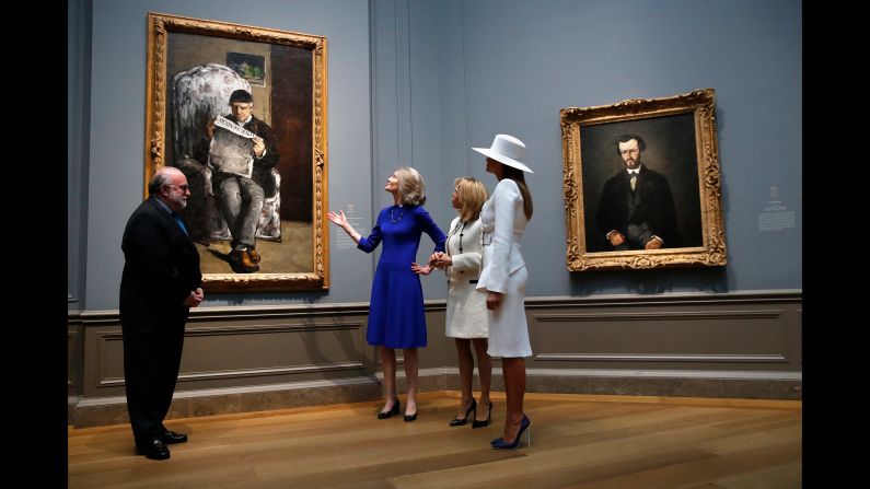 First ladies Melania Trump, right, and Brigitte Macron, second from right, tour the National Gallery of Art on April 24.