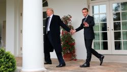 President Donald Trump and French President Emmanuel Macron walk to the Oval Office on April 24.