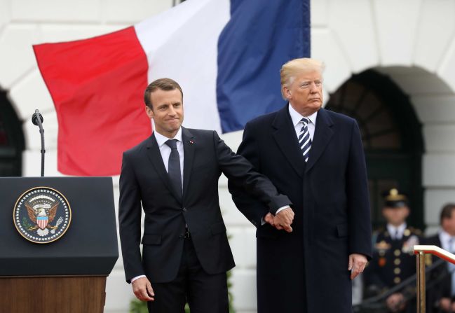 The Presidents put forward an elaborate show of friendship on the South Lawn, reviewing cordons of troops and recalling the long history between the United States and France.