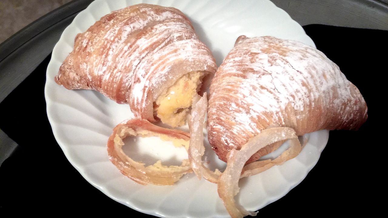 <strong>Food history: </strong>Pastry art also has a mythological origin. The cake pastiera, made of ricotta and candied orange peel, is said to be made by Parthenope in the deep sea to thank locals who worship her. The shell-shaped sfogliatelle pastry (pictured), with its vanilla-flavoured crunchy layers, has the texture of fish scales. 