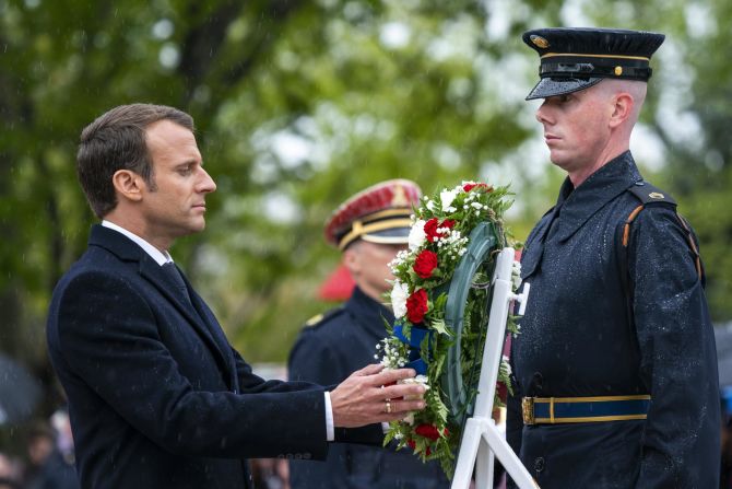 Macron lays a wreath at the Tomb of the Unknown Soldier on April 24, at Arlington National Cemetery in Virginia.