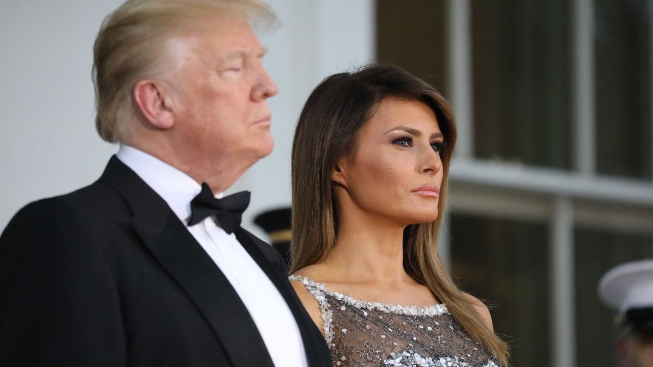 US President Donald Trump and First Lady Melania Trump arrive to welcome French President Emmanuel Macron and his wife, Brigitte Macron (unseen), for a State Dinner at the North Portico of the White House in Washington, DC, April 24, 2018. (Photo by Ludovic MARIN / AFP)        (Photo credit should read LUDOVIC MARIN/AFP/Getty Images)