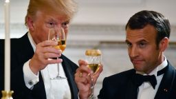 US President Donald Trump (L) and French President Emmanuel Macron (R) toast during a State Dinner in honor of Macron at the White House in Washington, DC, April 24, 2018. (Photo by Nicholas Kamm / AFP)        (Photo credit should read NICHOLAS KAMM/AFP/Getty Images)
