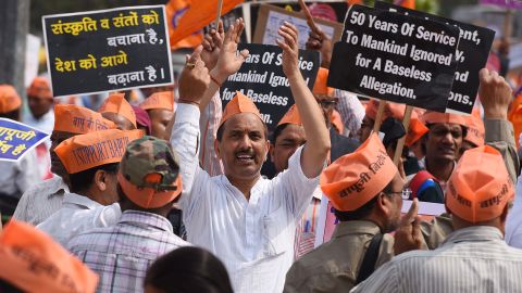 Supporters of self-styled spiritual leader Asaram Bapu, shout slogans to demand his release during a protest march, March 6, 2016 in New Delhi, India.