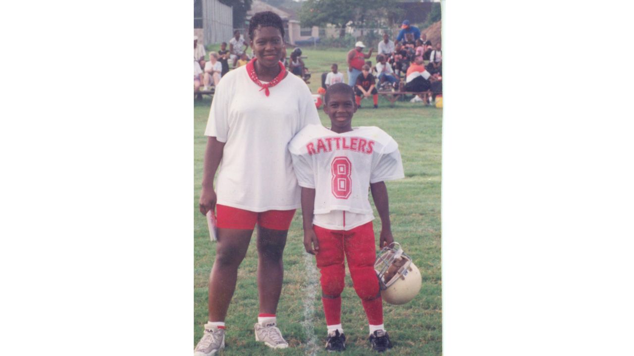 "My mom was a huge football fan," Mike James says of mom Elgusta, "and I got into football through her."