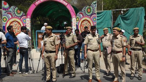 Indian policemen stand guard outside the ashram of controversial Indian guru Asaram Bapu on April 25, 2018.