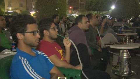 Fans in an Al Nasr City cafe watch on as Salah plays for Liverpool in the Champions League.