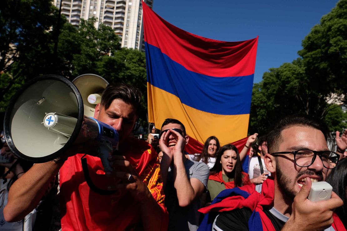 People march with Armenian flags as they commemorate the 103rd anniversary of the mass killings of Armenians by Ottoman forces on April 24, 2018, in Marseille, France.