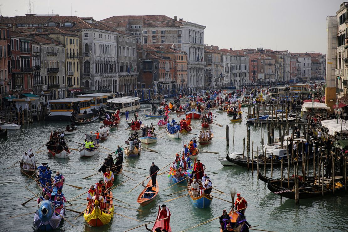 The overcrowded Grand Canal during the masquerade parade during Venice Carnival in February 2017.