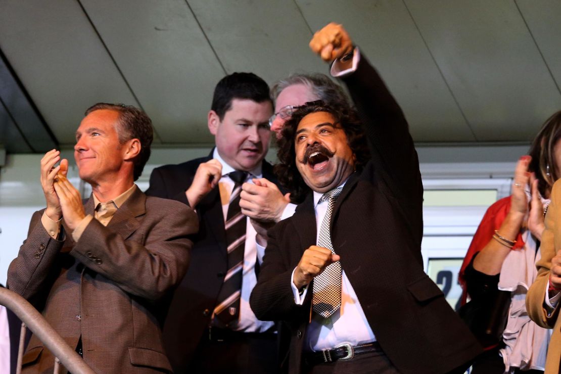 Khan celebrates a Fulham goal.