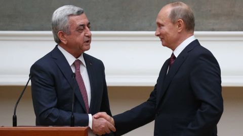 Russian President Vladimir Putin, right, and then-Armenian President Serzh Sargsyan are seen visiting an exhibition in Moscow last November.