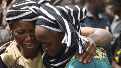 Women at a funeral service for people killed following weeks of violence between cattle herders and farmers on January 11, 2018 in Benue State, Nigeria.
