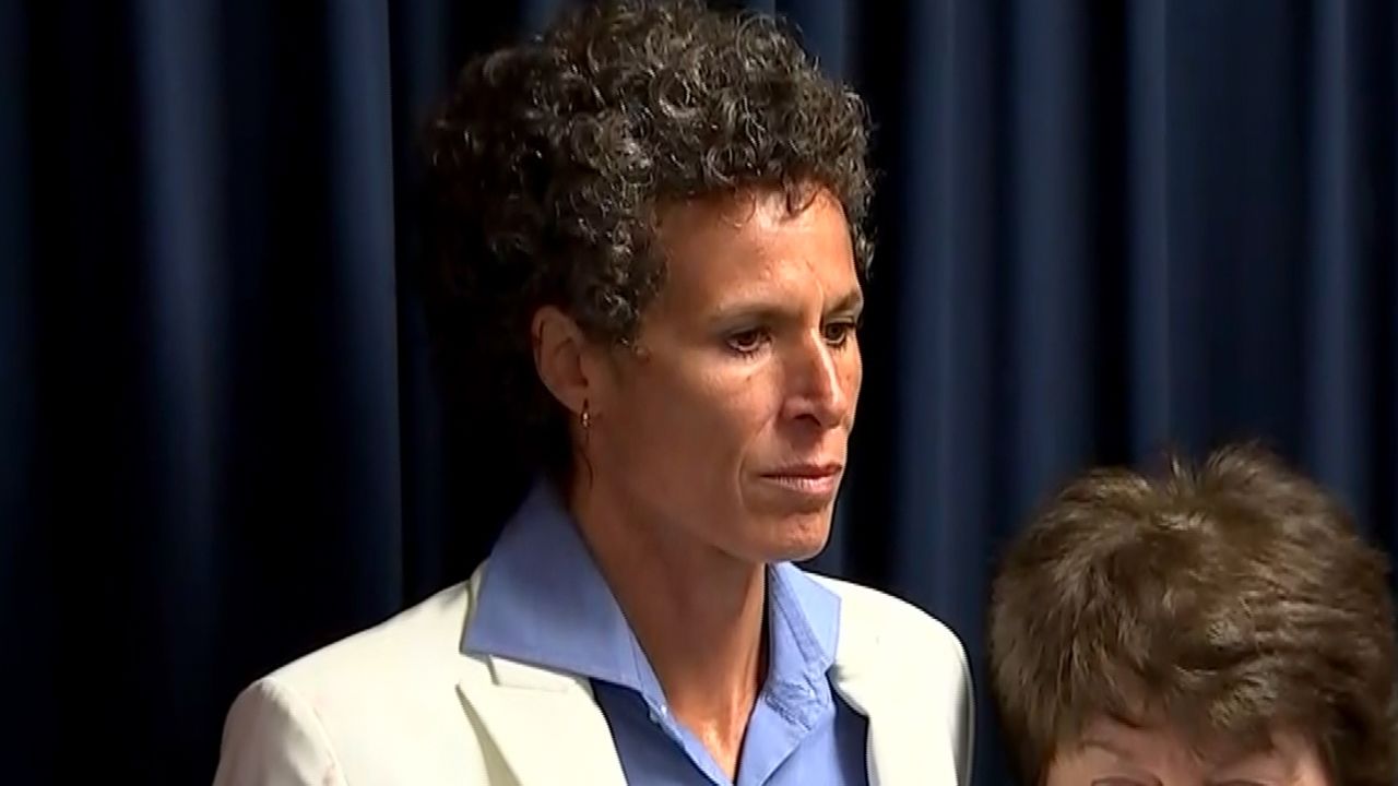 Andrea Constand stands at a press conference after Bill Cosby was found guilty on April 26, 2018.