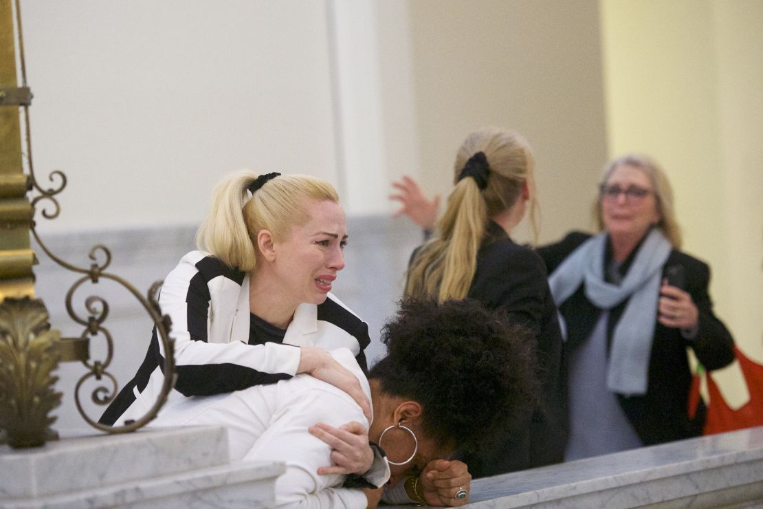 Bill Cosby accusers  Caroline Heldman, left; Lili Bernard, center; and Victoria Valentino react outside the court house after the guilty verdict was announced.