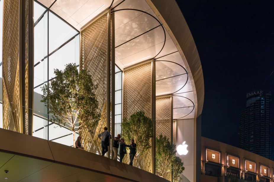 Apple's store in Dubai Mall. Designed by Foster + Partners, the retail space features signature "solar wings," inspired by Arabic Mashrabiya, a style of wooden latticework.