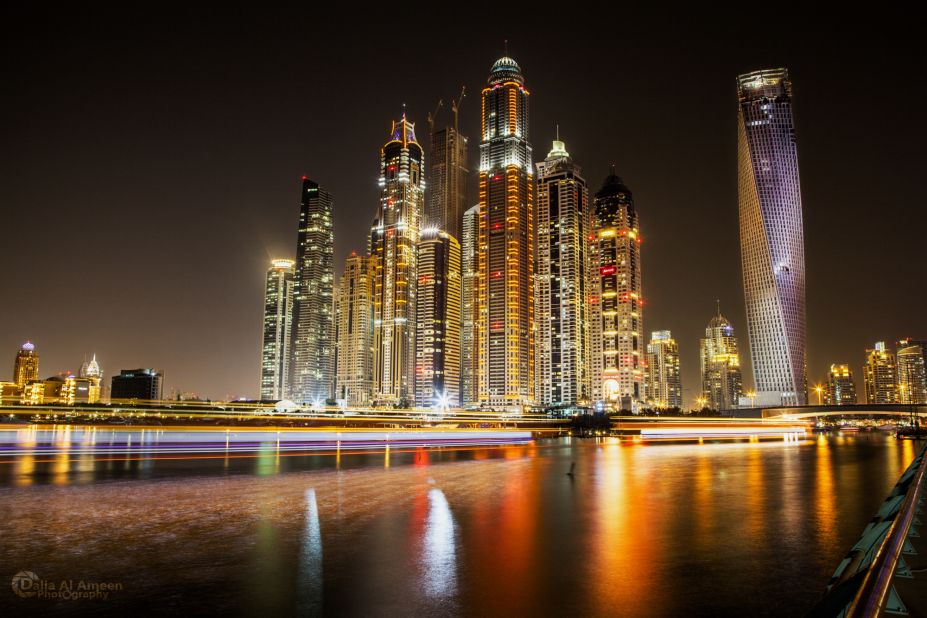 The Cayan Tower, previously known as the Infinity Tower, is defined as a "supertall" building at over 300m (984 feet) and functions as a luxury apartment complex.