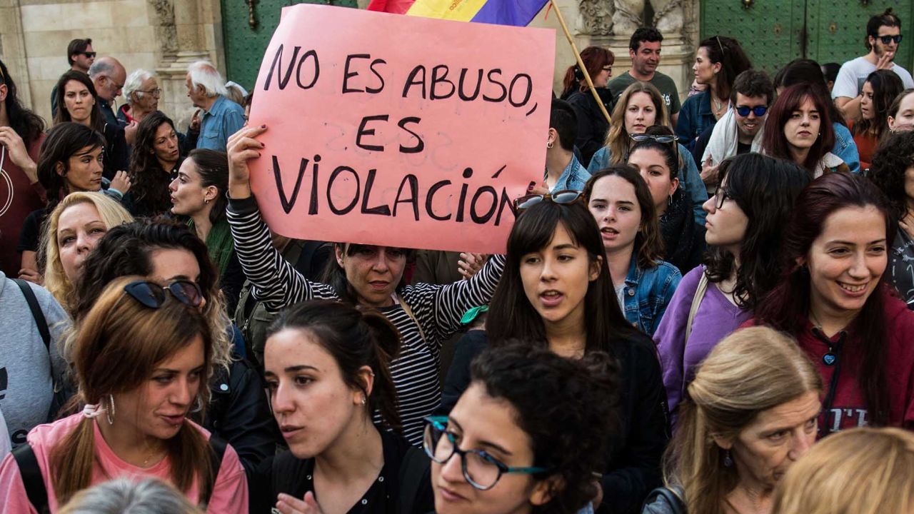 A woman protests Thursday in Alicante, Spain, with a placard that reads: "It is not abuse, it is rape."