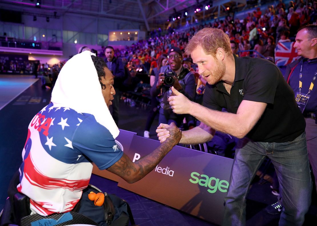 "Prince Harry today... sees his unique position as an opportunity to change things for the good," says Jackson. And the Invictus Games is one of those opportunities. Here, Harry is seen congratulating the US team after they won the Wheelchair Basketball gold at the 2017 Games in Toronto.