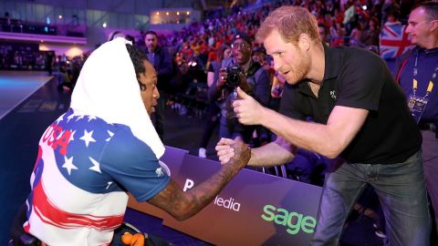 "Prince Harry today... sees his unique position as an opportunity to change things for the good," says Jackson. And the Invictus Games is one of those opportunities. Here, Harry is seen congratulating the US team after they won the Wheelchair Basketball gold at the 2017 Games in Toronto.