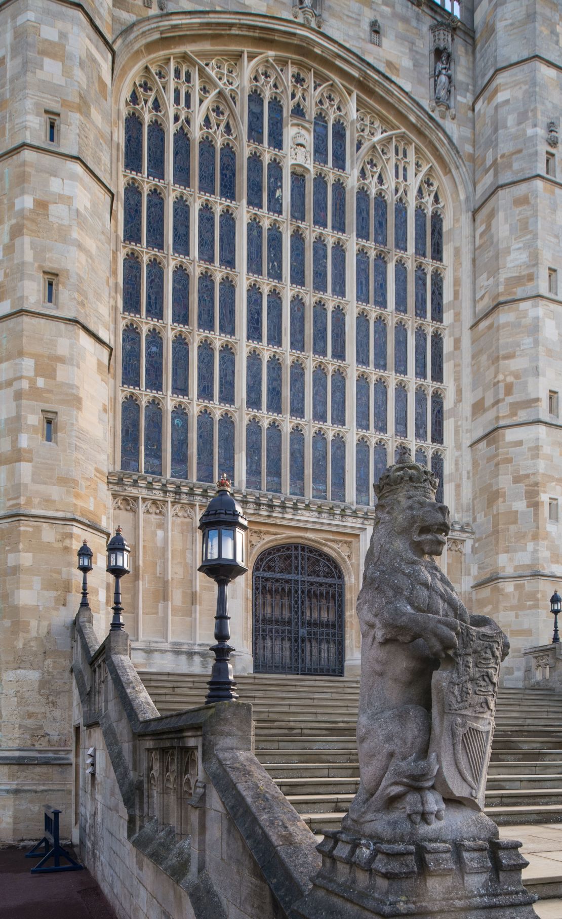 The steps to St George's Chapel, guarded by crowned lion, which features on the royal coat of arms.
