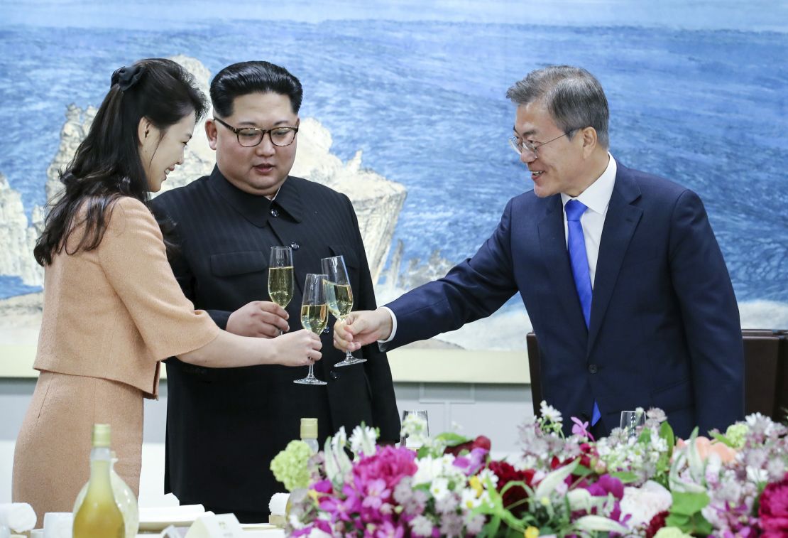 South Korean President Moon Jae-in, right, toasts Ri Sol Ju, wife of North Korean leader Kim Jong Un at a banquet that concluded the summit.