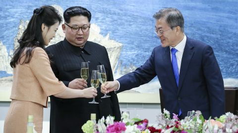 South Korean President Moon Jae-in, right, toasts Ri Sol Ju, wife of North Korean leader Kim Jong Un at a banquet that concluded the summit.