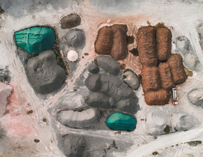 Other recent projects have seen the 27-year-old photographing quarries, farmland, coal mines and waterways discolored by the byproducts of industry. 