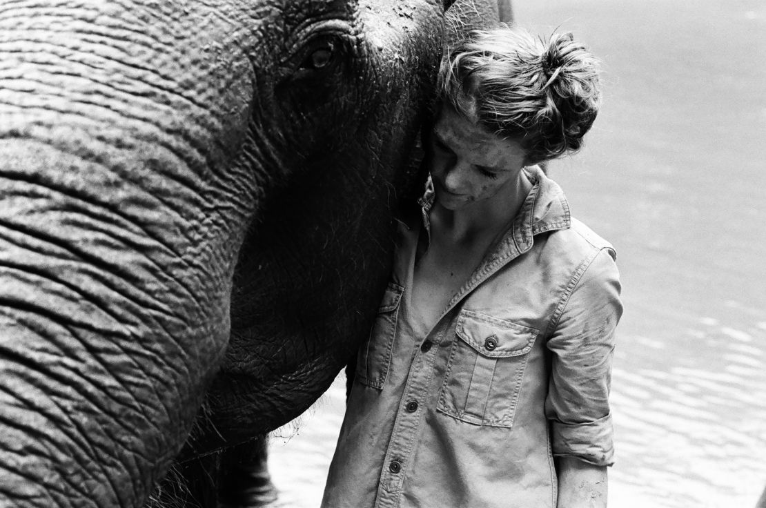 Ashley Bell and an Asian elephant during filming for "Love and Bananas." 
