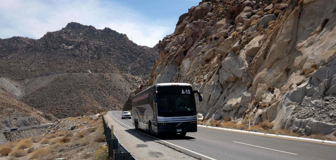 A bus carrying migrants on the road of La Rumorosa, in Tecate, Baja California state.