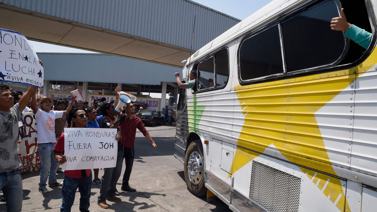 Central American migrants are welcomed as they arrive at a shelter in Mexico City.