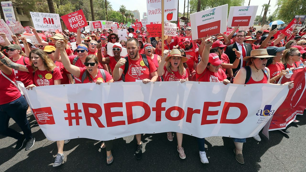 Thousands of Arizona teachers march to the State Capitol during their walkout April 26 to demand better wages and more funding for public schools.