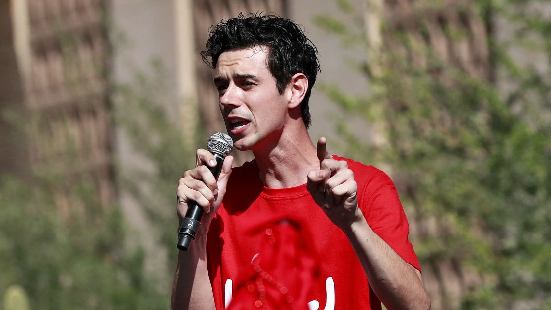 Music teacher Noah Karvelis addresses supporters at the Capitol in Phoenix on Friday.