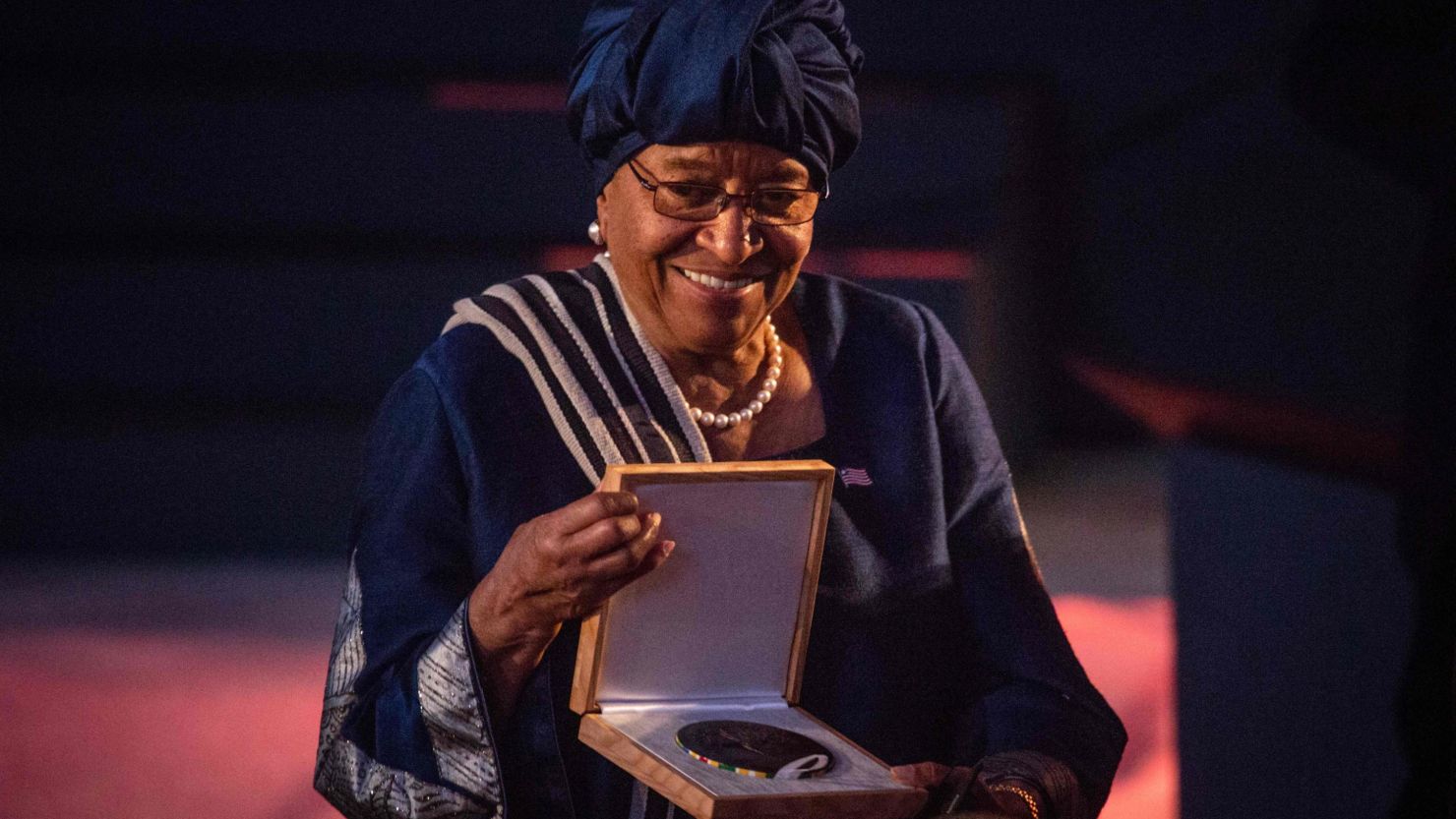 Ellen Johnson Sirleaf reacts Friday after receiving the Ibrahim Prize at the Kigali Convention Centre in Kigali, Rwanda.