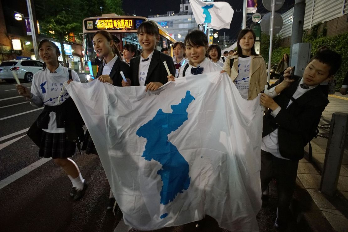 Koreans in Japan celebrate the  summit in a rally Friday. 